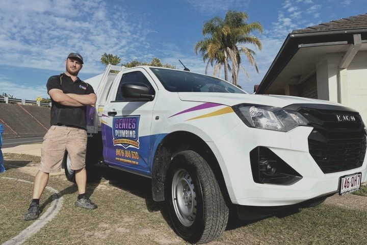 Genies plumber with the work ute on a job