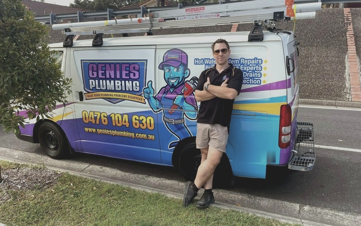 Genies Plumbing van and licensed plumber on a Gold Coast job