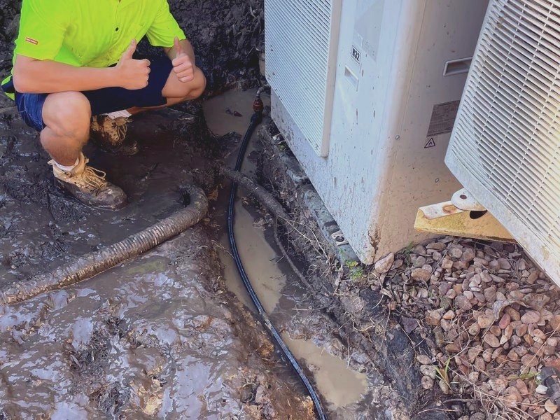 Genies plumber tracing a burst water line